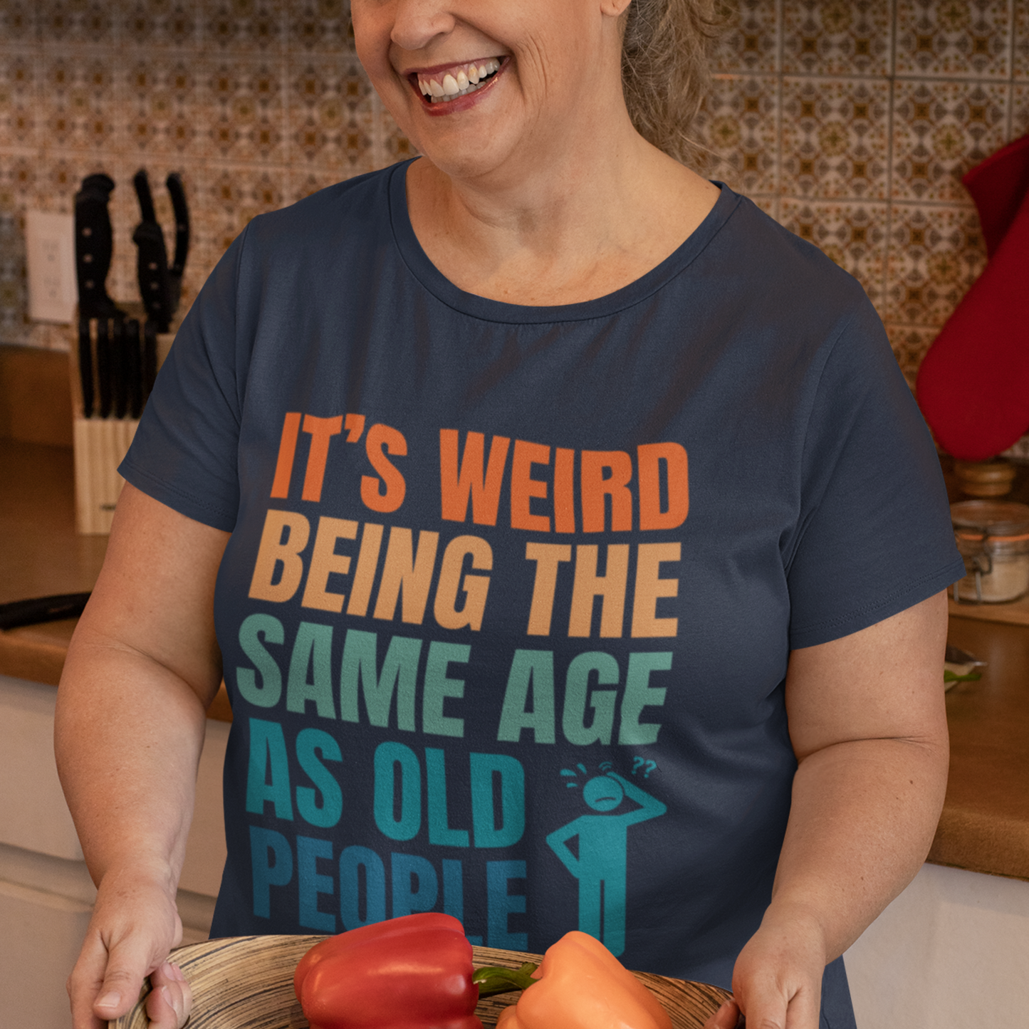 Navy blue tee featuring bold, multi-color lettering and with a pictogram of a person scratching their head in confusion