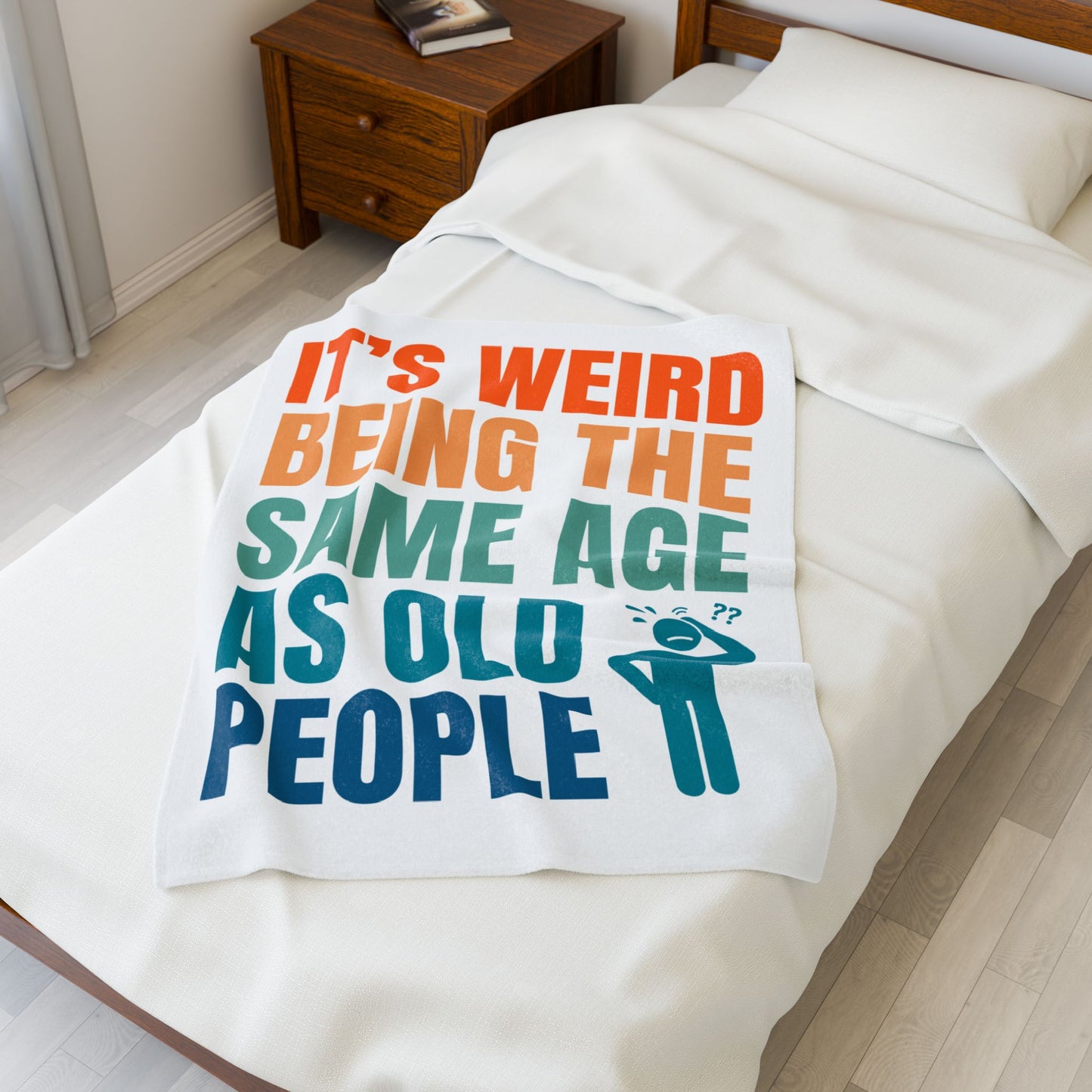 30 X 40 Blanket with humorous text and graphic on a bed in a bedroom setting
