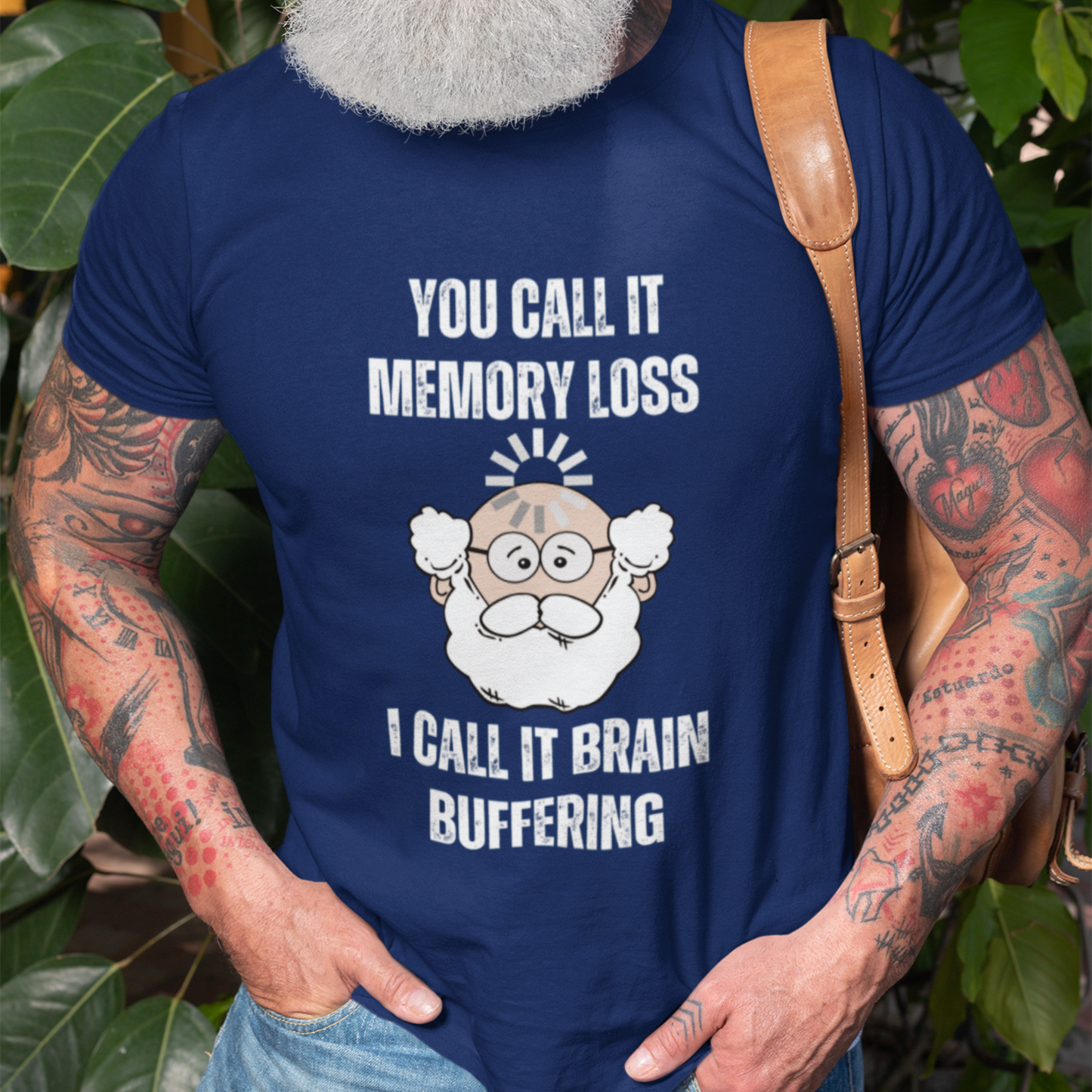 Navy blue t-shirt featuring the phrase 'Brain Buffering' with a loading icon graphic and a bald, bearded light-tone senior.