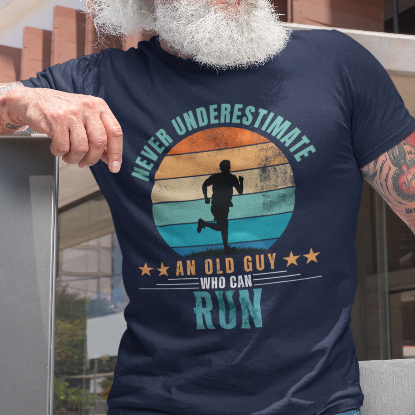 Navy blue tee featuring silhouette of a jogger against a distressed striped sunset