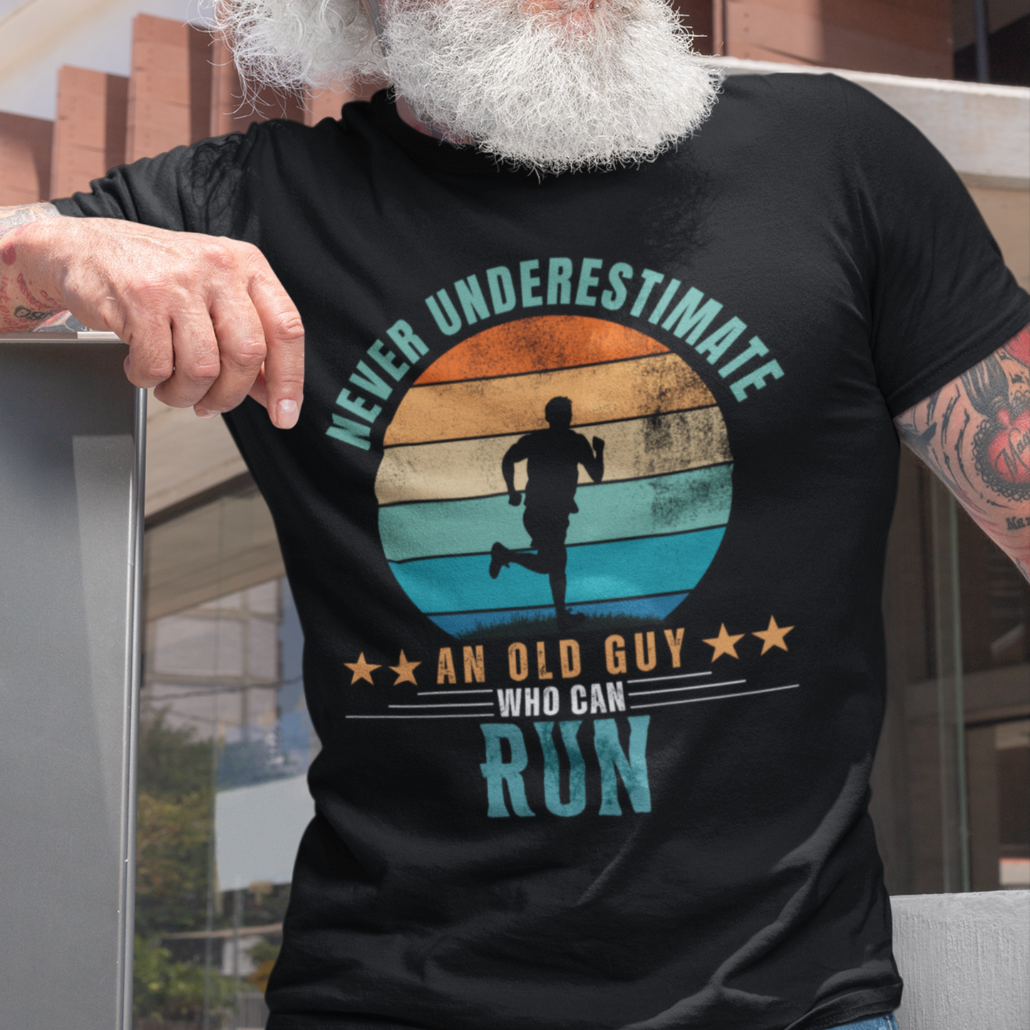 Black tee featuring silhouette of a jogger against a distressed striped sunset