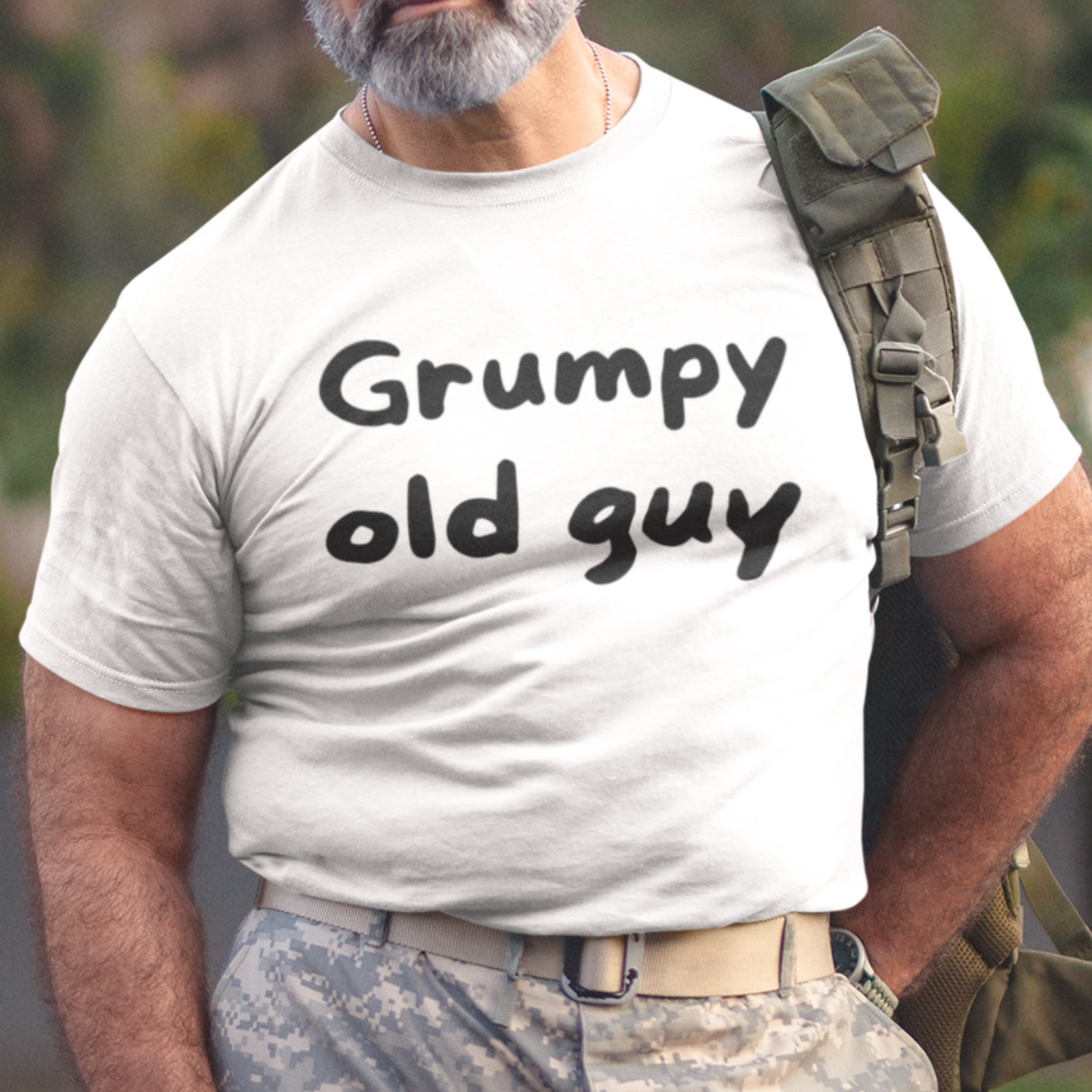 White t-shirt with bold lettering stating "Grumpy Old Man"