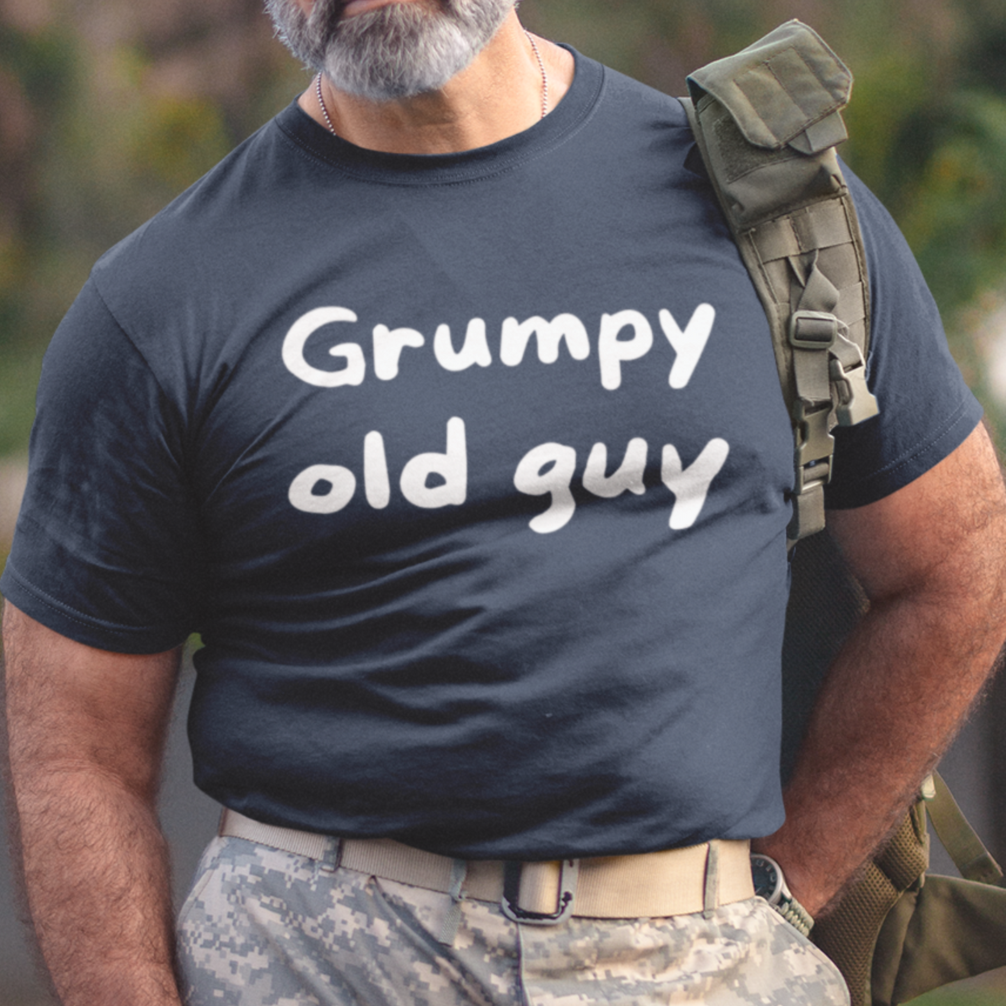 Navy blue t-shirt with bold lettering stating "Grumpy Old Man"