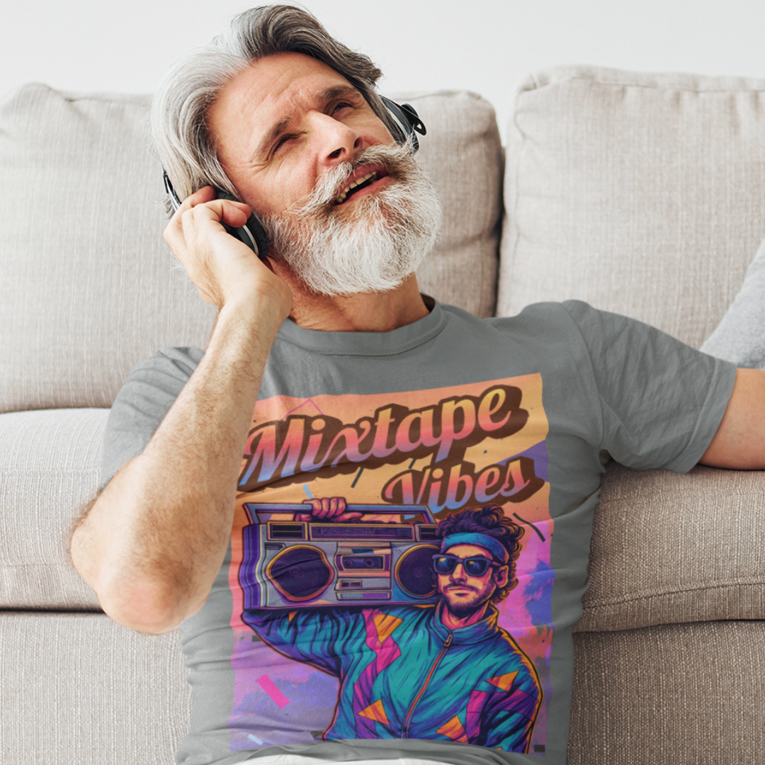 Heather gray tee featuring a young man girl from the 1980s listening to his boom box with a pastel sunset in the background