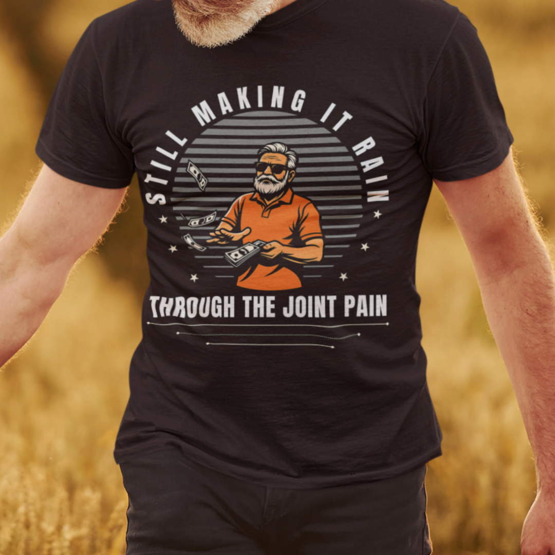 Black t-shirt with a gray-bearded man in an orange golf shirt raining dollar bills
