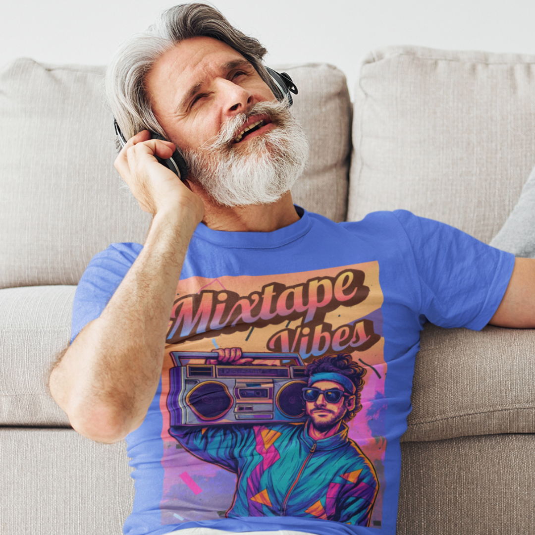 Royal blue tee featuring a young man girl from the 1980s listening to his boom box with a pastel sunset in the background