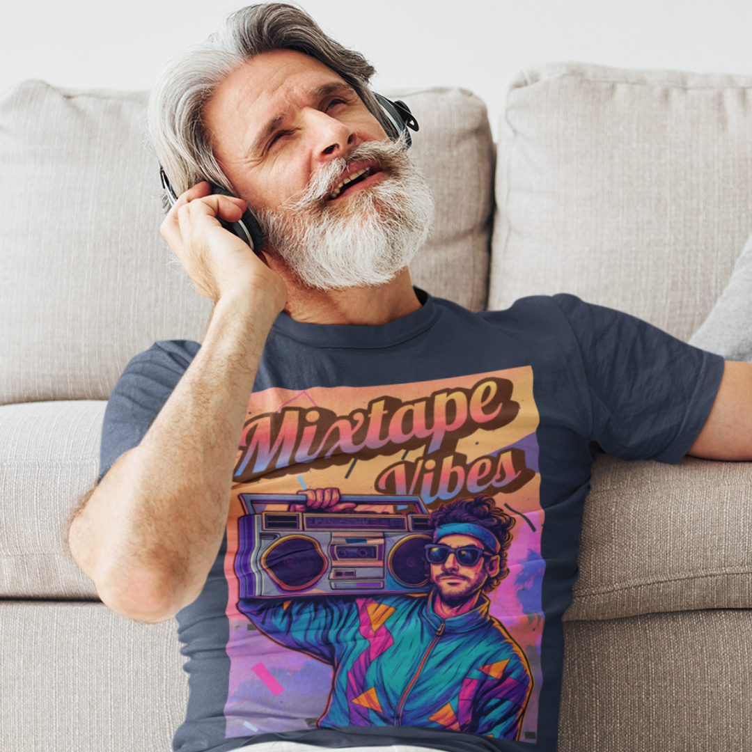 Navy blue tee featuring a young man girl from the 1980s listening to his boom box with a pastel sunset in the background