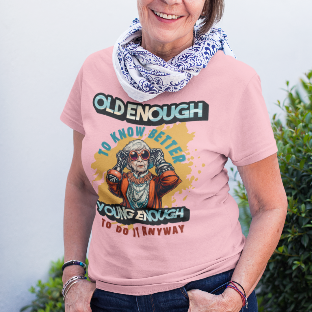 Light pink tee featuring an older woman in over the top fashion is full of attitude and lightheartedness