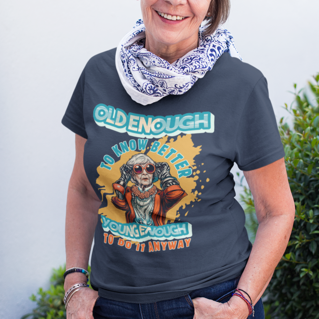 Navy blue tee featuring an older woman in over the top fashion is full of attitude and lightheartedness