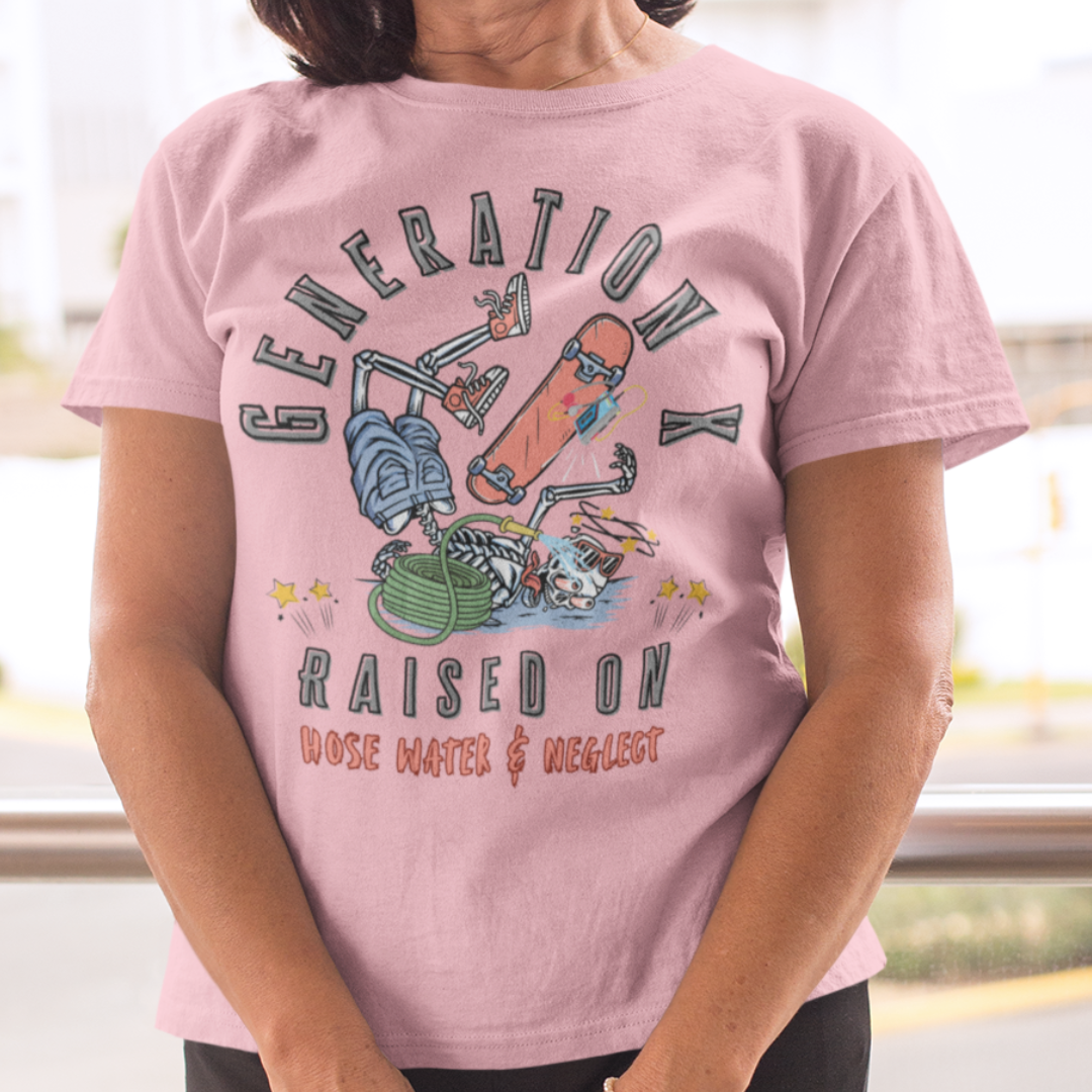 Person wearing a pink t-shirt with graphic design and text.