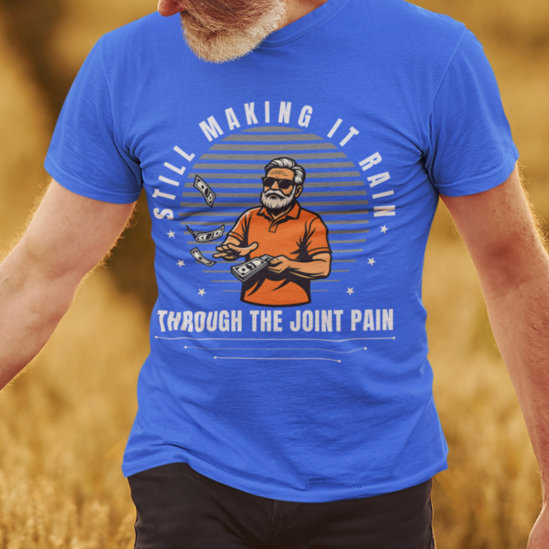 Royal blue t-shirt with a gray-bearded man in an orange golf shirt raining dollar bills