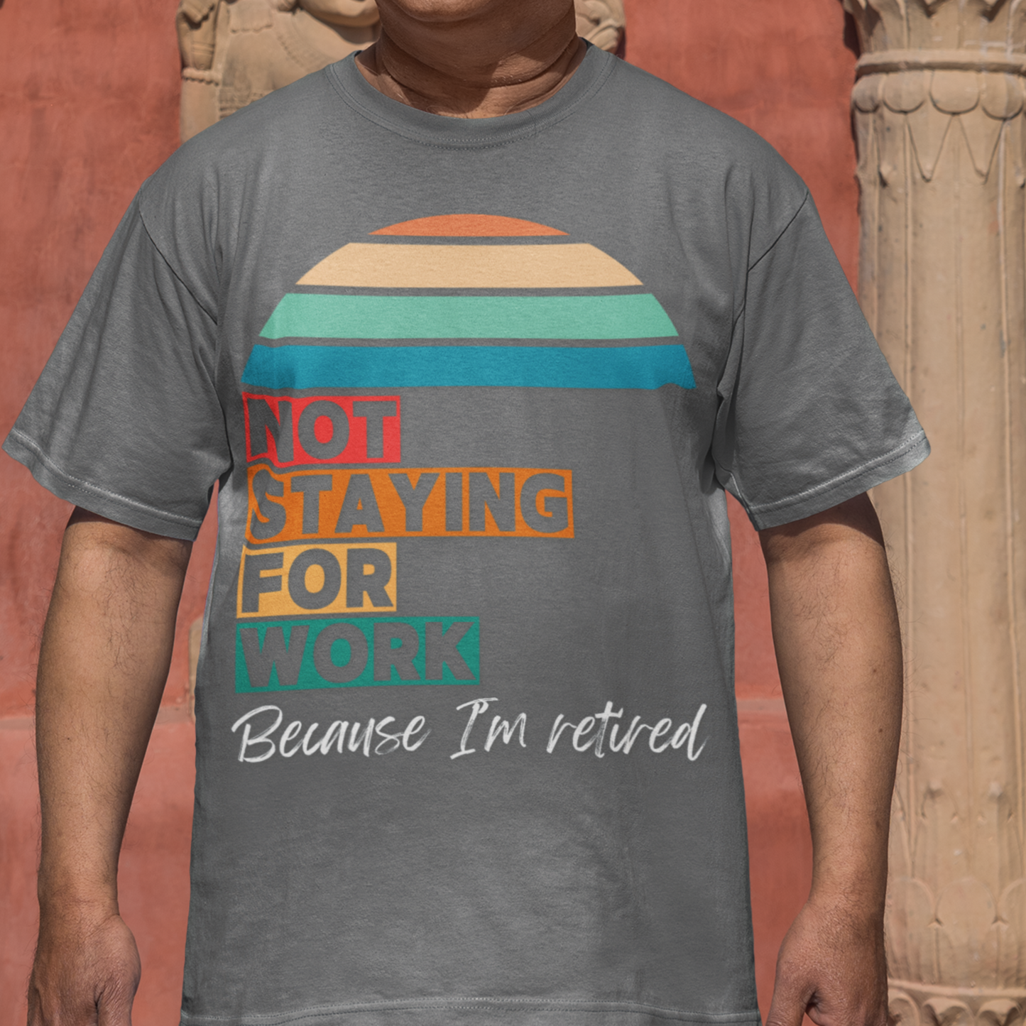 Gray tee in multi-color block lettering and rainbow sun reads Not Staying for Work I'm Retired
