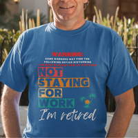 Royal blue tee featuring a NSFW warning in multi-color block lettering reads Not Staying for Work I'm Retired 