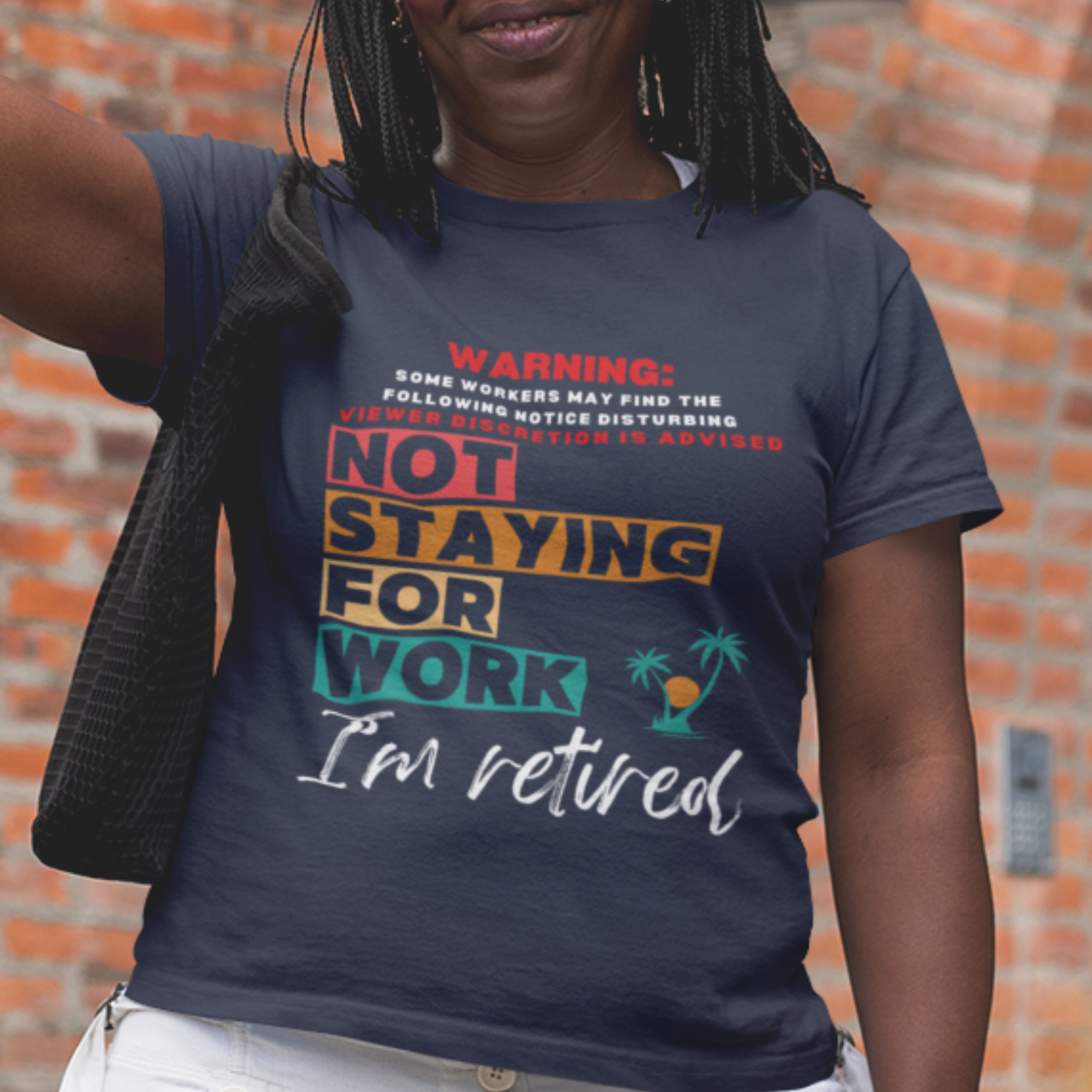 Navy blue tee featuring a NSFW warning in multi-color block lettering reads Not Staying for Work I'm Retired