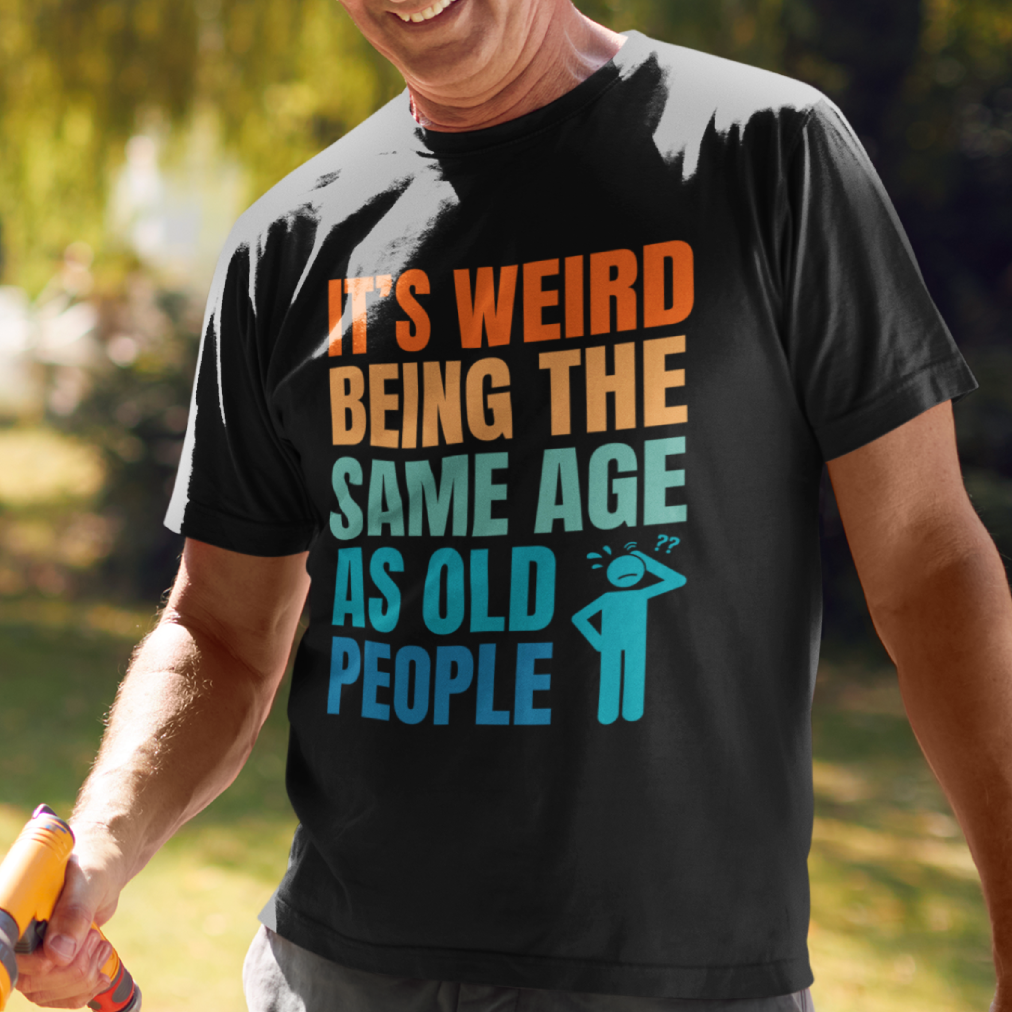 Black tee featuring bold, multi-color lettering and with a pictogram of a person scratching their head in confusion