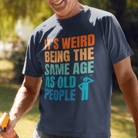 Navy blue tee featuring bold, multi-color lettering and with a pictogram of a person scratching their head in confusion