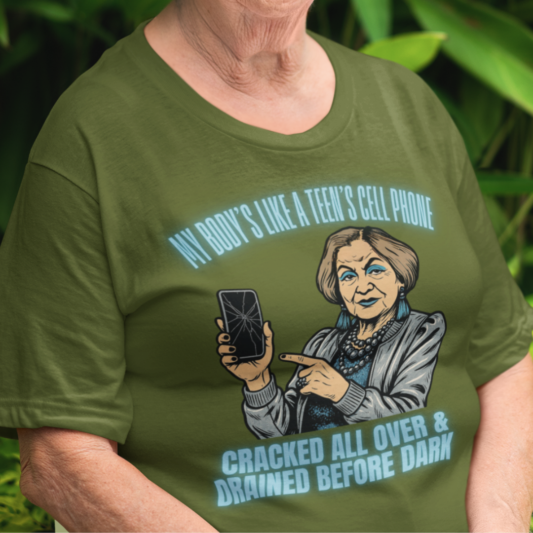 Military green t-shirt featuring a cartoon older woman pointing to a broken cell phone 