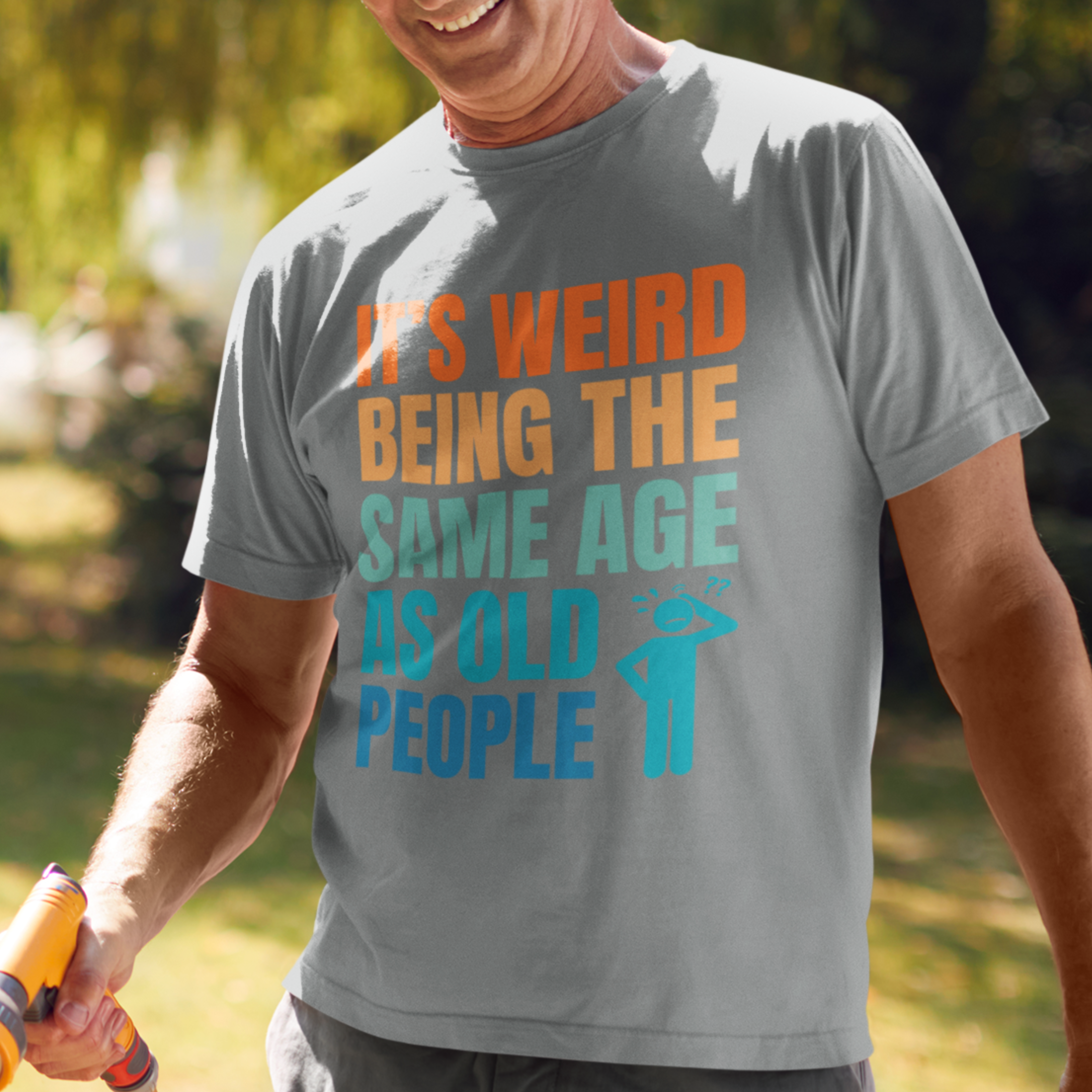 Heather gray tee featuring bold, multi-color lettering and with a pictogram of a person scratching their head in confusion