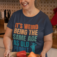Navy blue tee featuring bold, multi-color lettering and with a pictogram of a person scratching their head in confusion