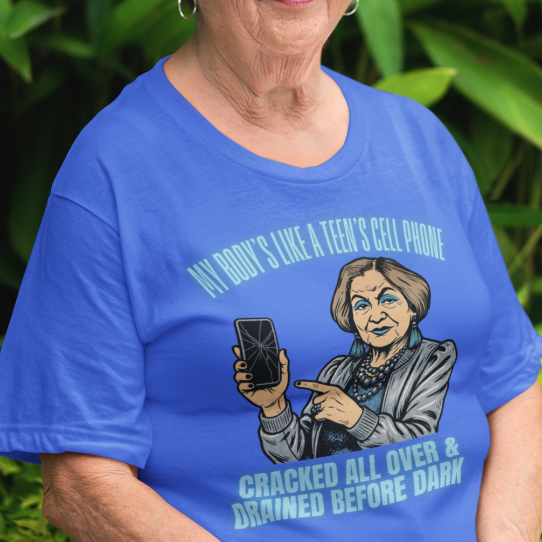 Royal blue t-shirt featuring a cartoon older woman pointing to a broken cell phone 