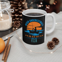 IRL black mug with fishing design and text on a table with decorative items