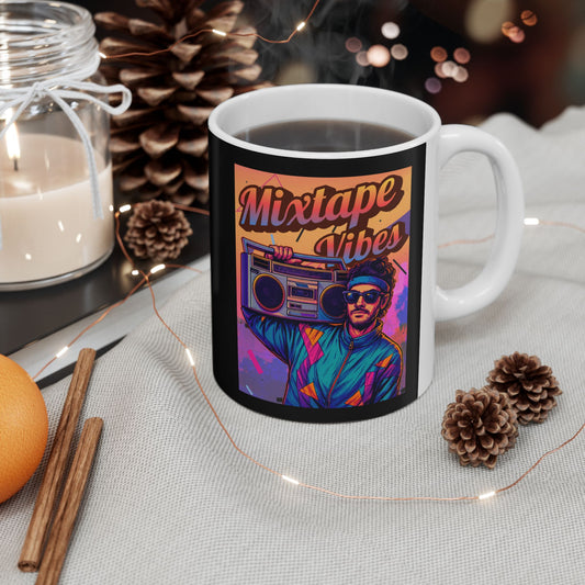 Mug with 'Mixtape Vibes' design featuring a person with a boombox, surrounded by decorative items on a table.