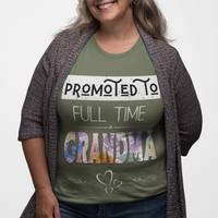 Military green t-shirt featuring bold and floral lettering that reads "Promoted to Full Time Grandma"