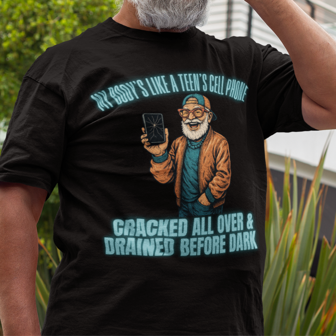Black t-shirt featuring a cartoon white-bearded man with a broken cell phone, laughing