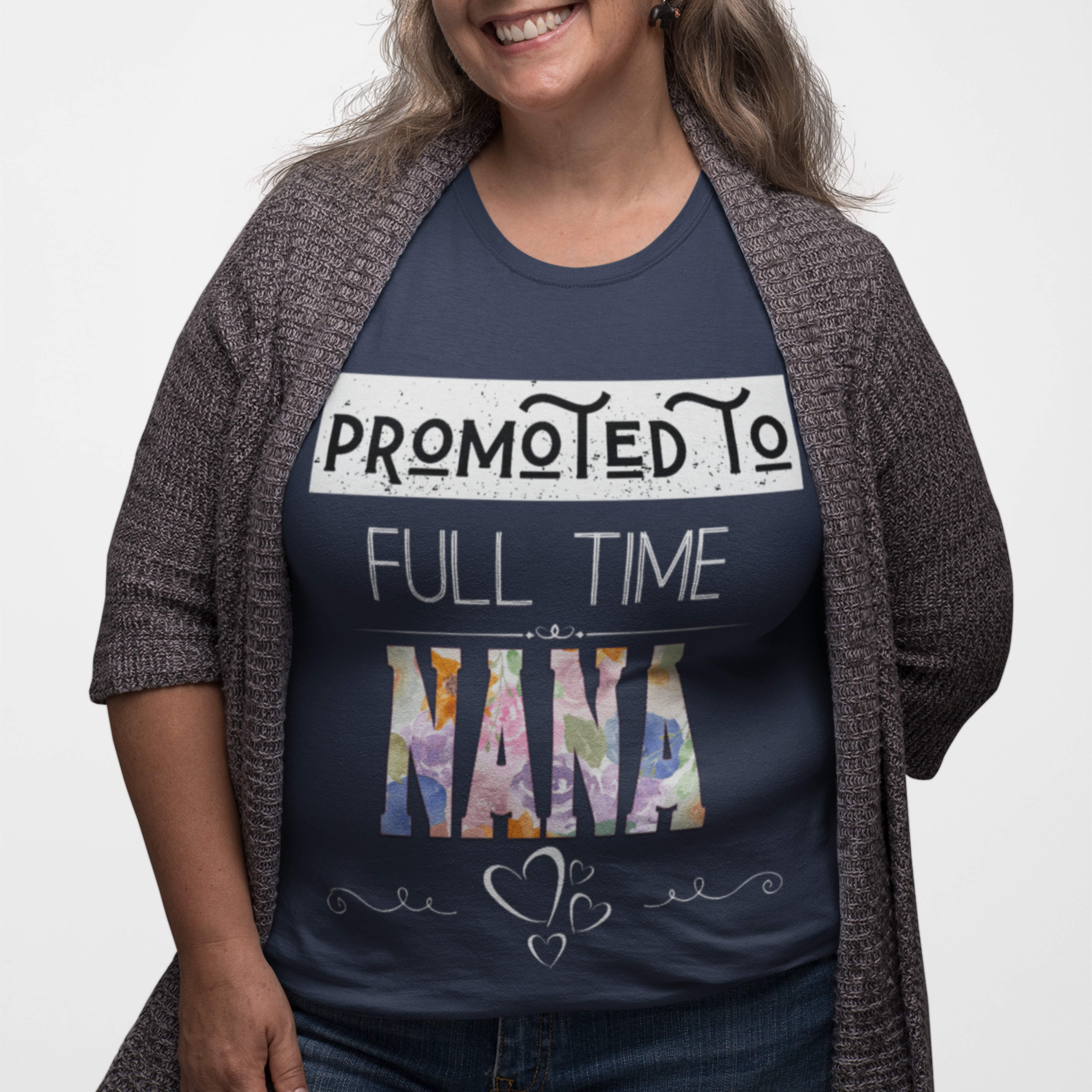 Navy blue tee featuring bold and floral lettering that reads "Promoted to Full Time Nana"