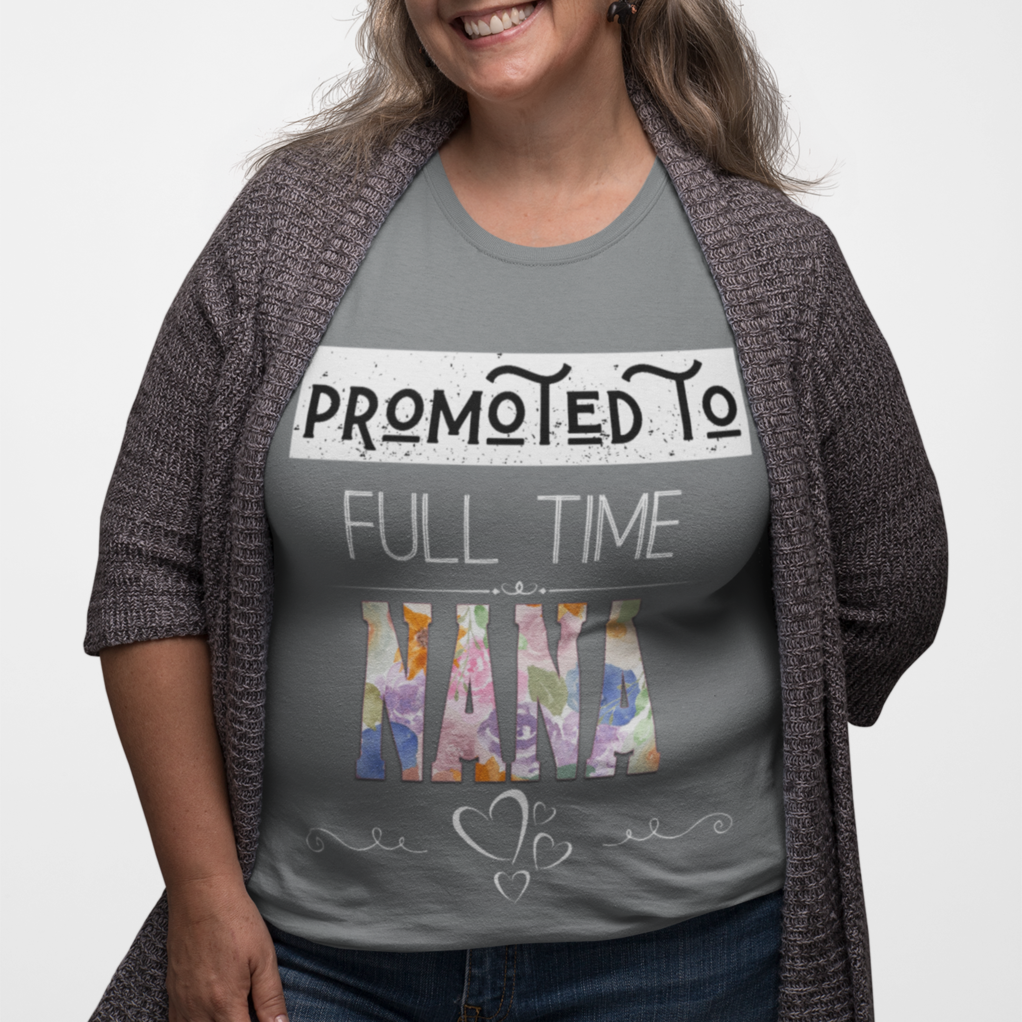 Gray tee featuring bold and floral lettering that reads "Promoted to Full Time Nana"