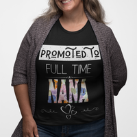 Black tee featuring bold and floral lettering that reads "Promoted to Full Time Nana"