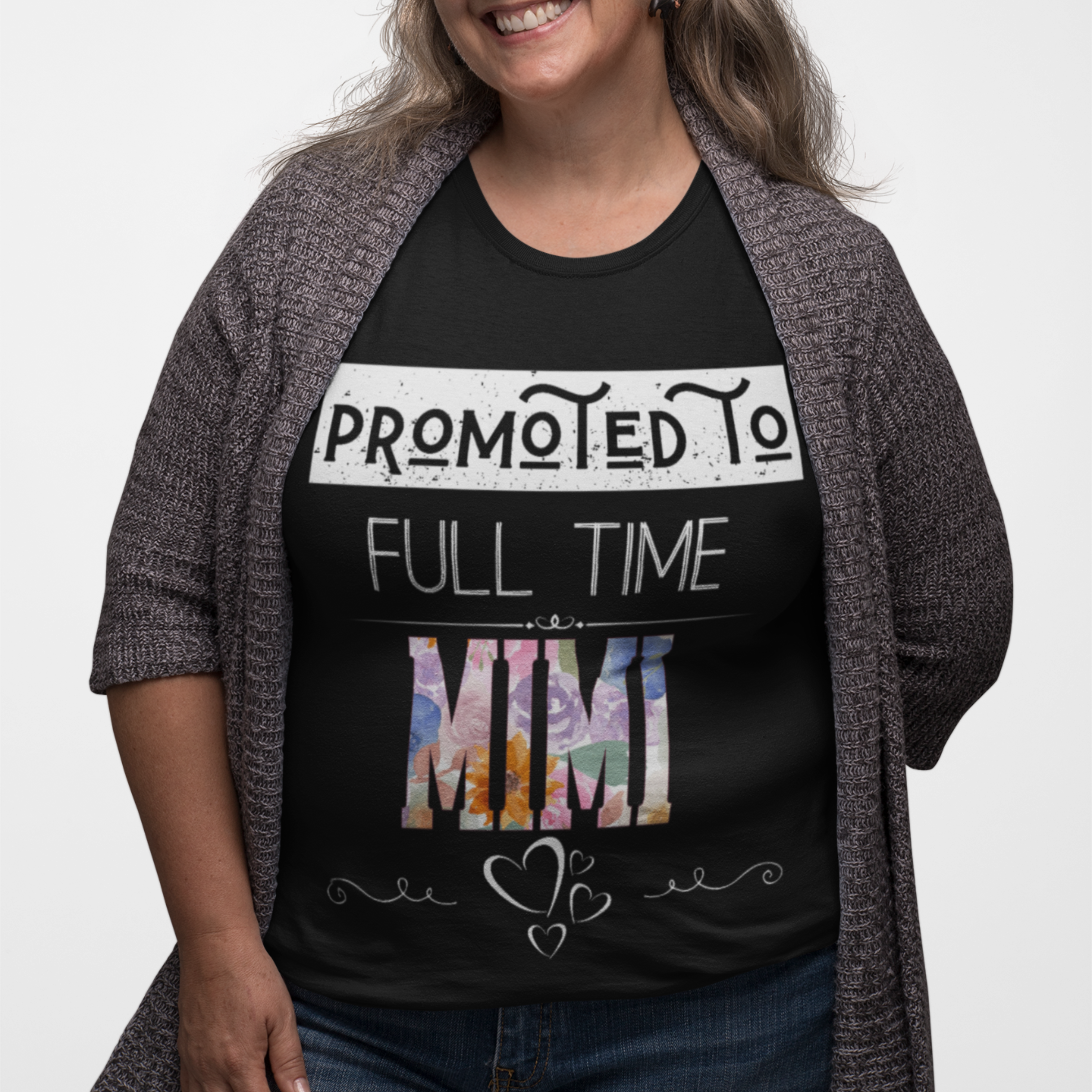 Black tee featuring bold and floral lettering that reads "Promoted to Full Time Mimi"