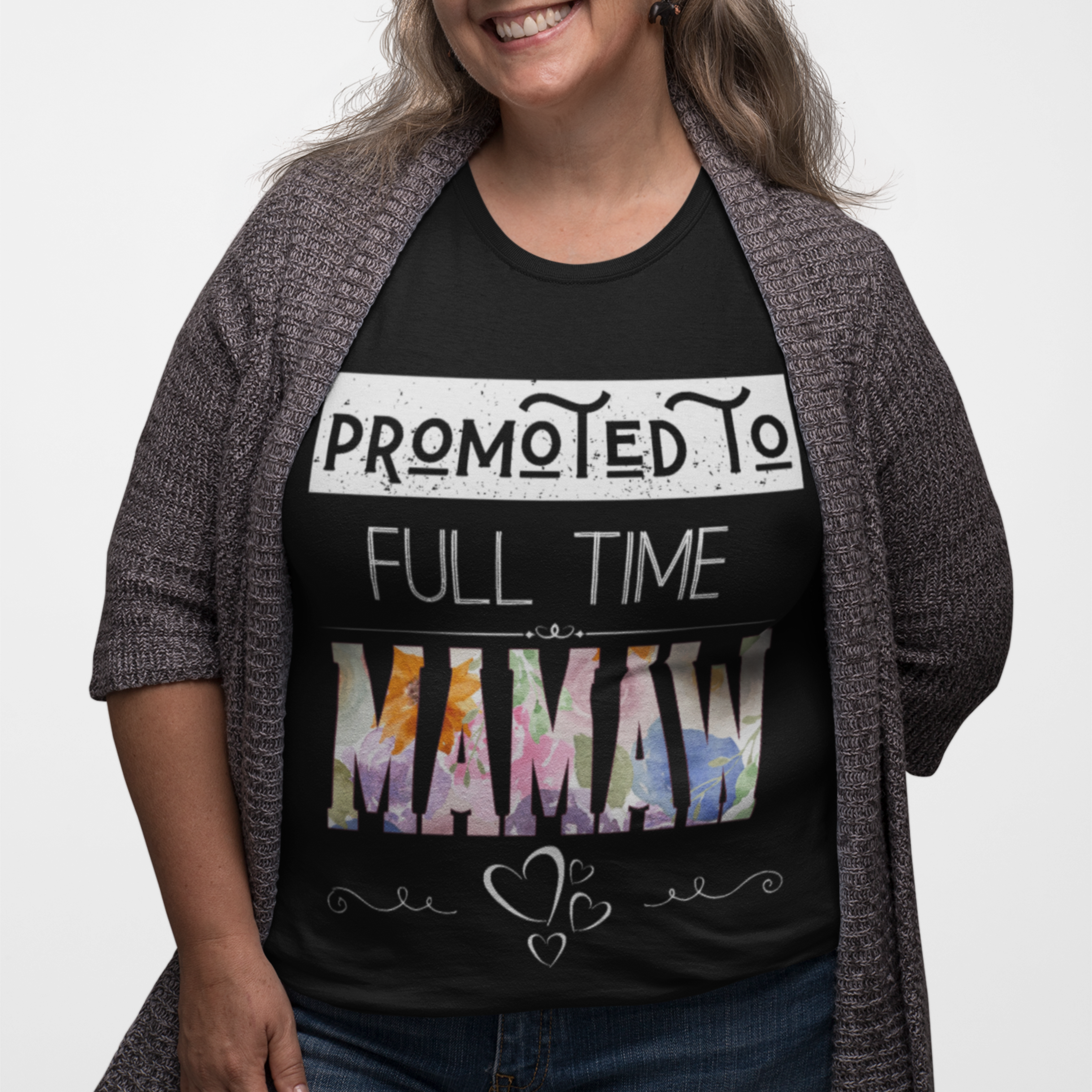 Black tee featuring bold and floral lettering that reads "Promoted to Full Time Mamaw"