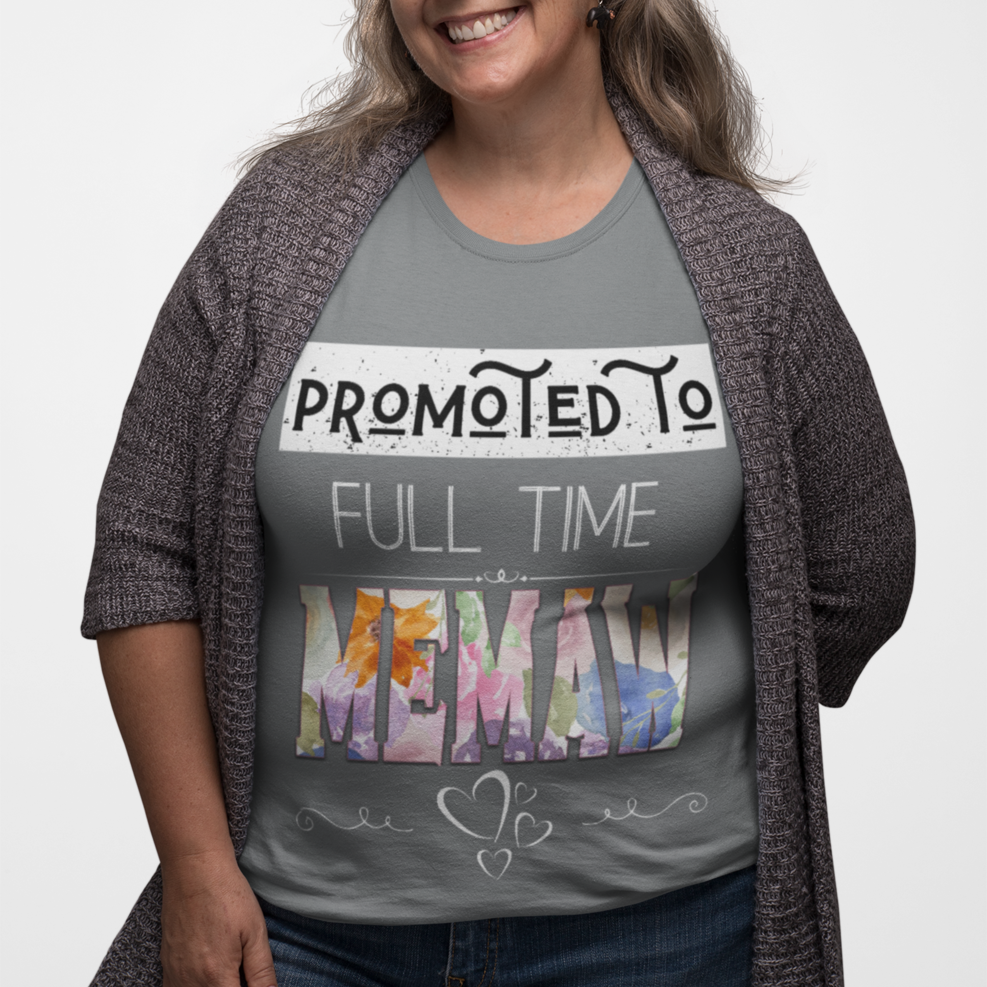 Gray tee featuring bold and floral lettering that reads "Promoted to Full Time Memaw"