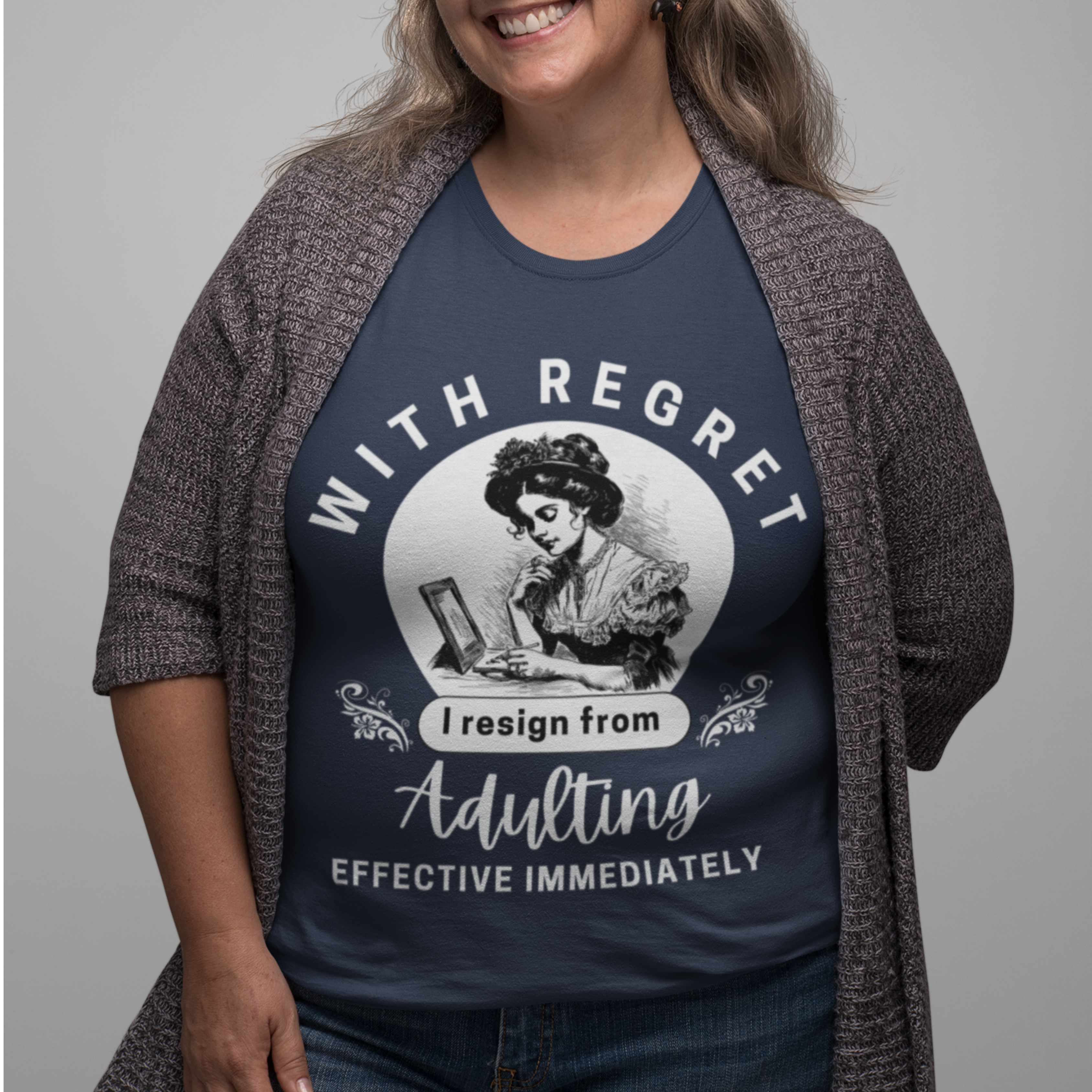 Navy blue tee featuring an old-fashioned lady handwriting her resignation letter to Adulting