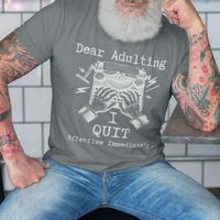 Heather gray t-shirt featuring a man's hand typing out his resignation letter to Adulting on an old typewriter