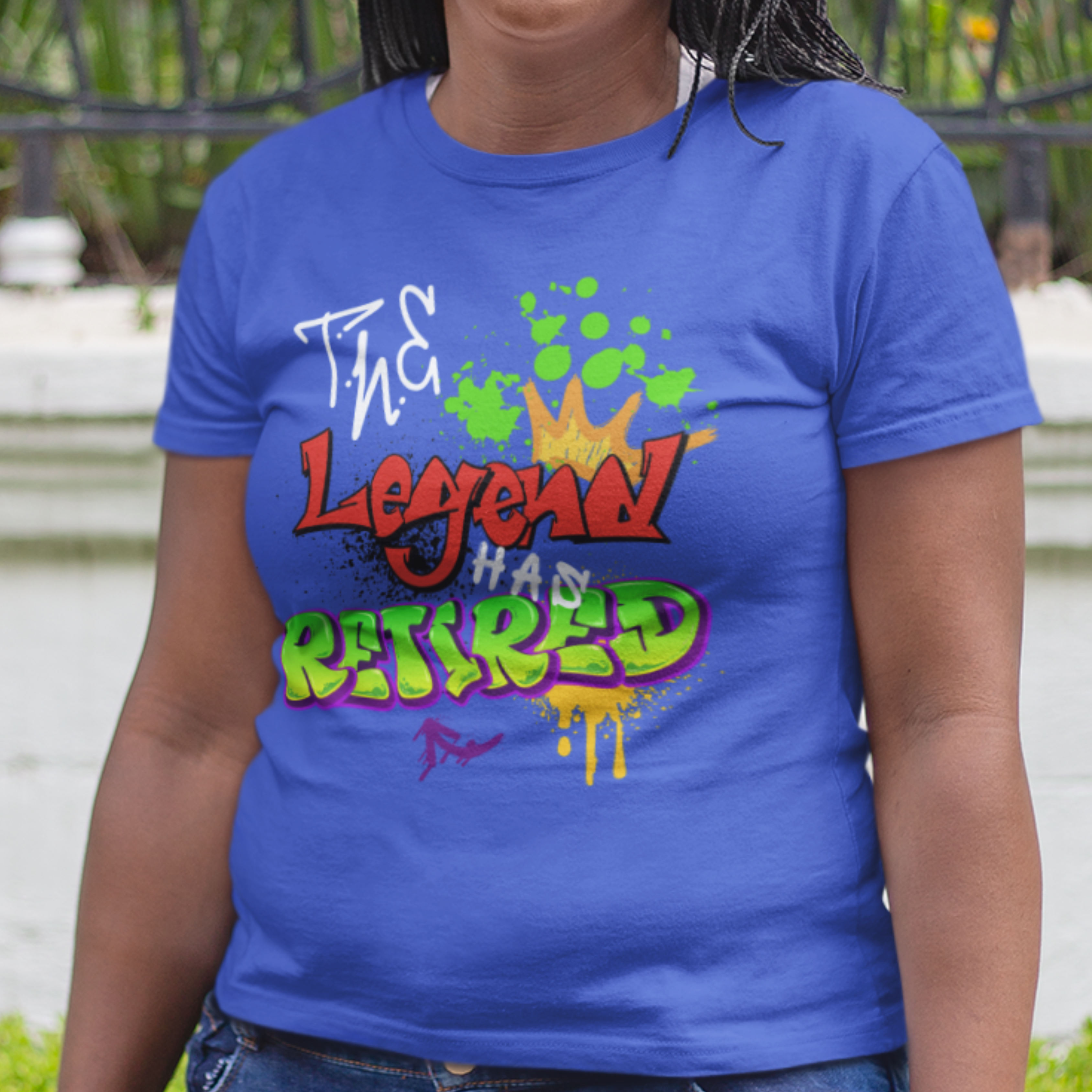 Royal blue t-shirt featuring bold graffiti style fonts states "The Legend Has Retired"