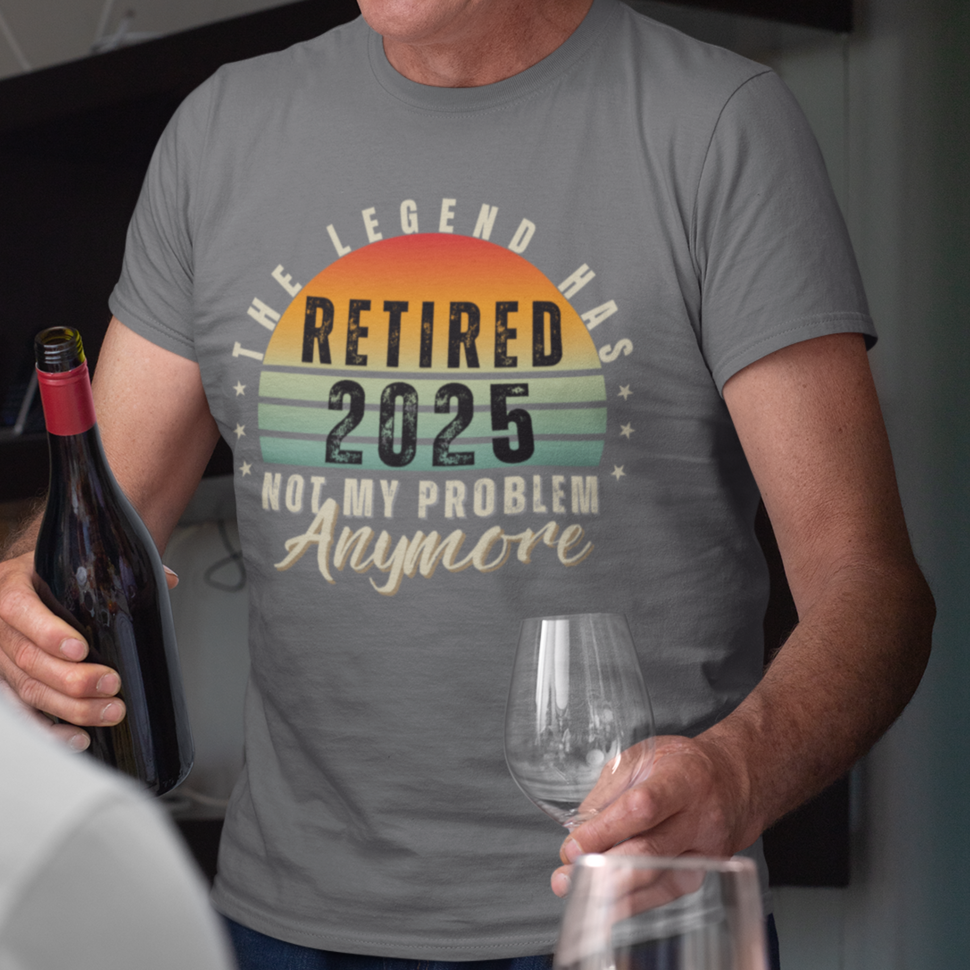 Gray t-shirt featuring a striped sunset that reads The Legend Has Retired Not My Problem Anymore