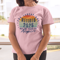 Pink t-shirt featuring a striped sunset that reads The Legend Has Retired Not My Problem Anymore