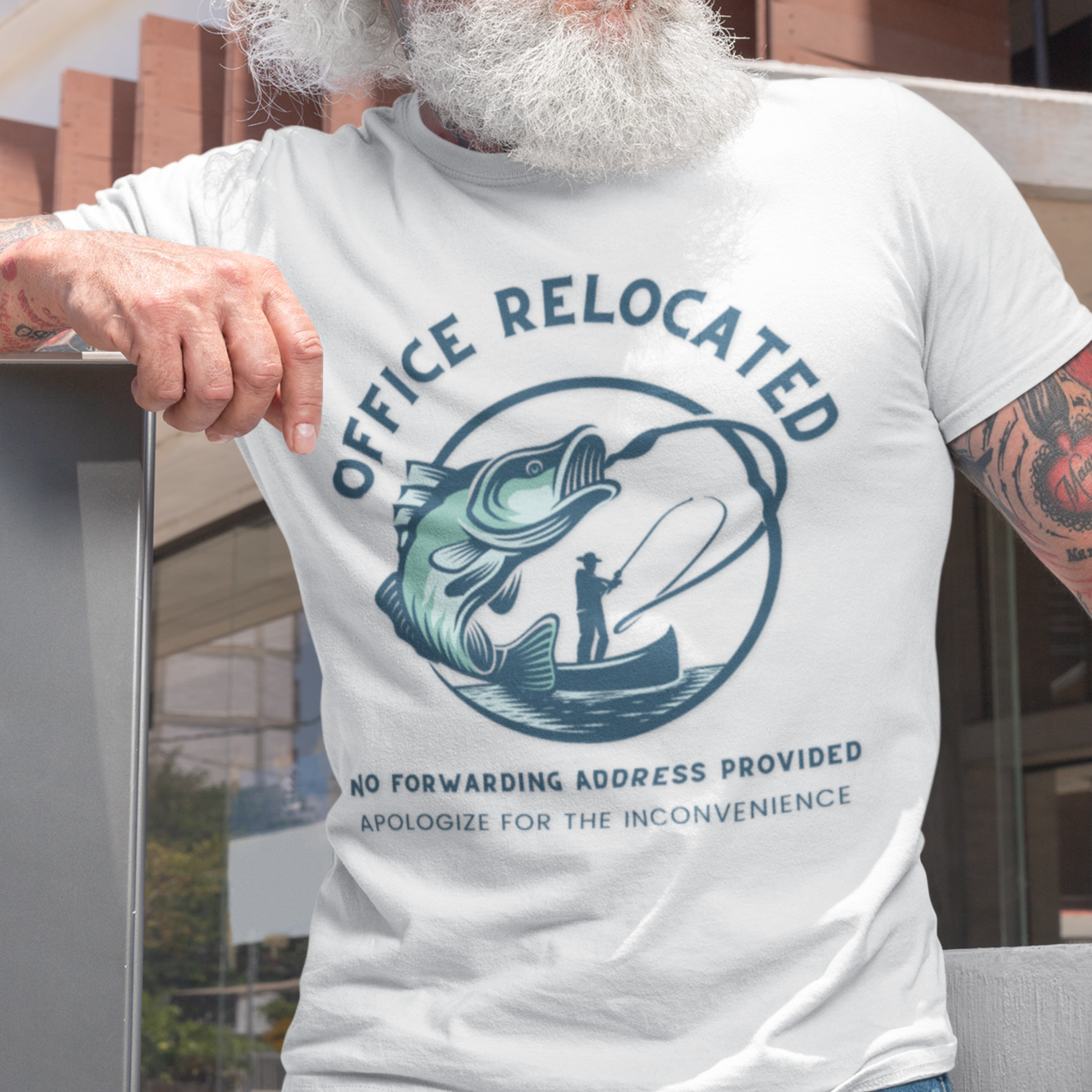 White t-shirt featuring a fisherman hooking a big bass that reads Office Relocated No Forwarding Address Provided Apologize for the Inconvenience