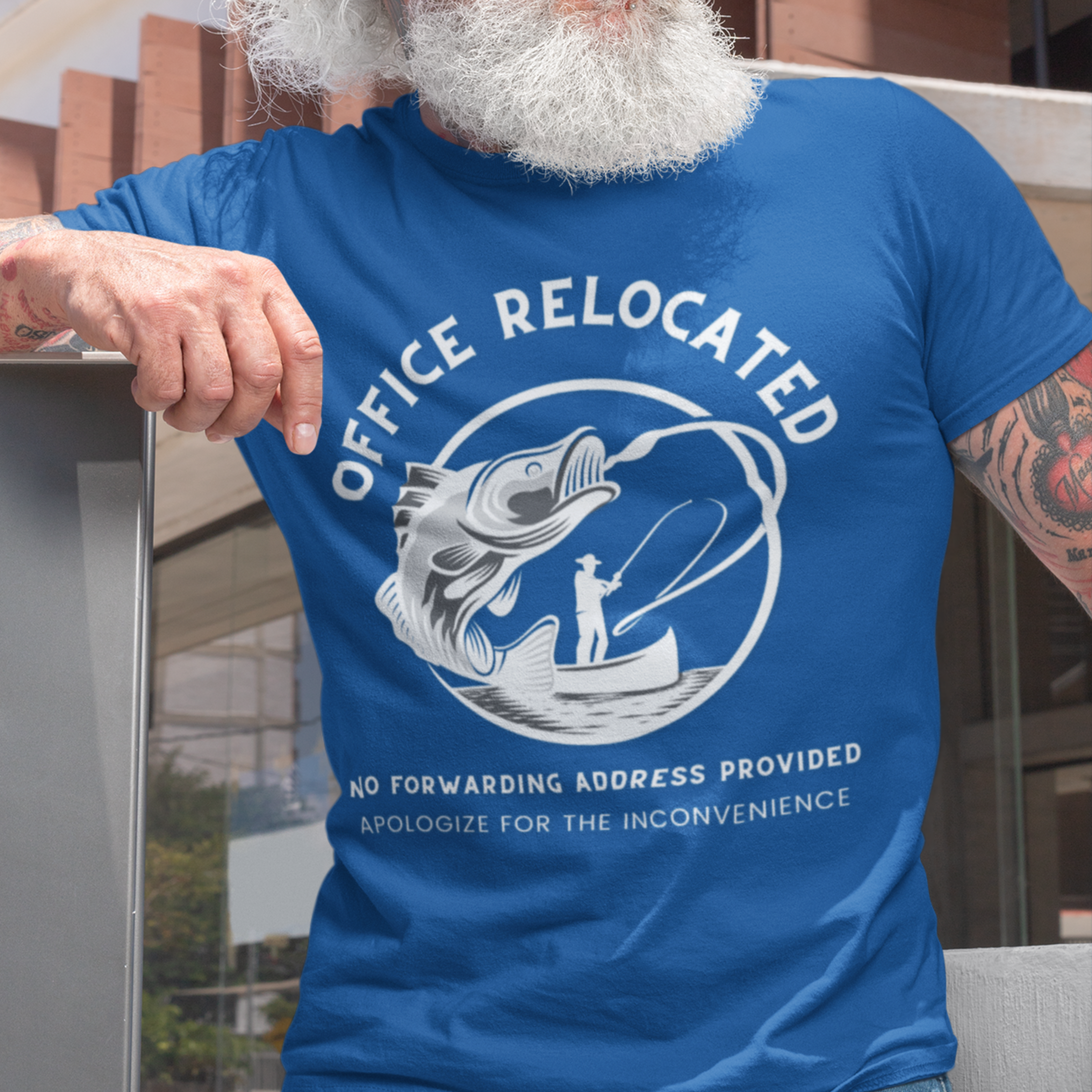 Royal blue t-shirt featuring a fisherman hooking a big bass that reads Office Relocated No Forwarding Address Provided Apologize for the Inconvenience