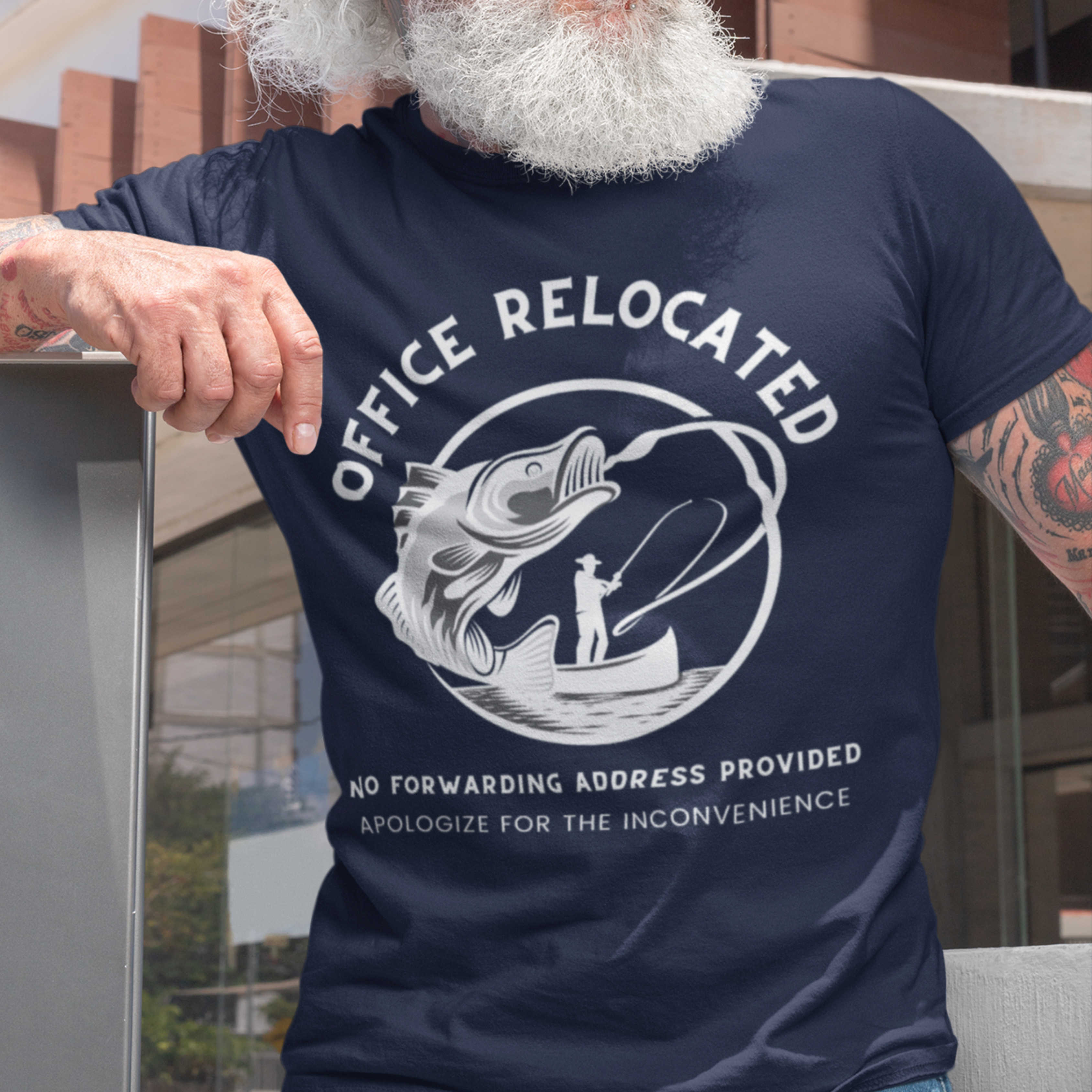 Navy blue t-shirt featuring a fisherman hooking a big bass that reads Office Relocated No Forwarding Address Provided Apologize for the Inconvenience