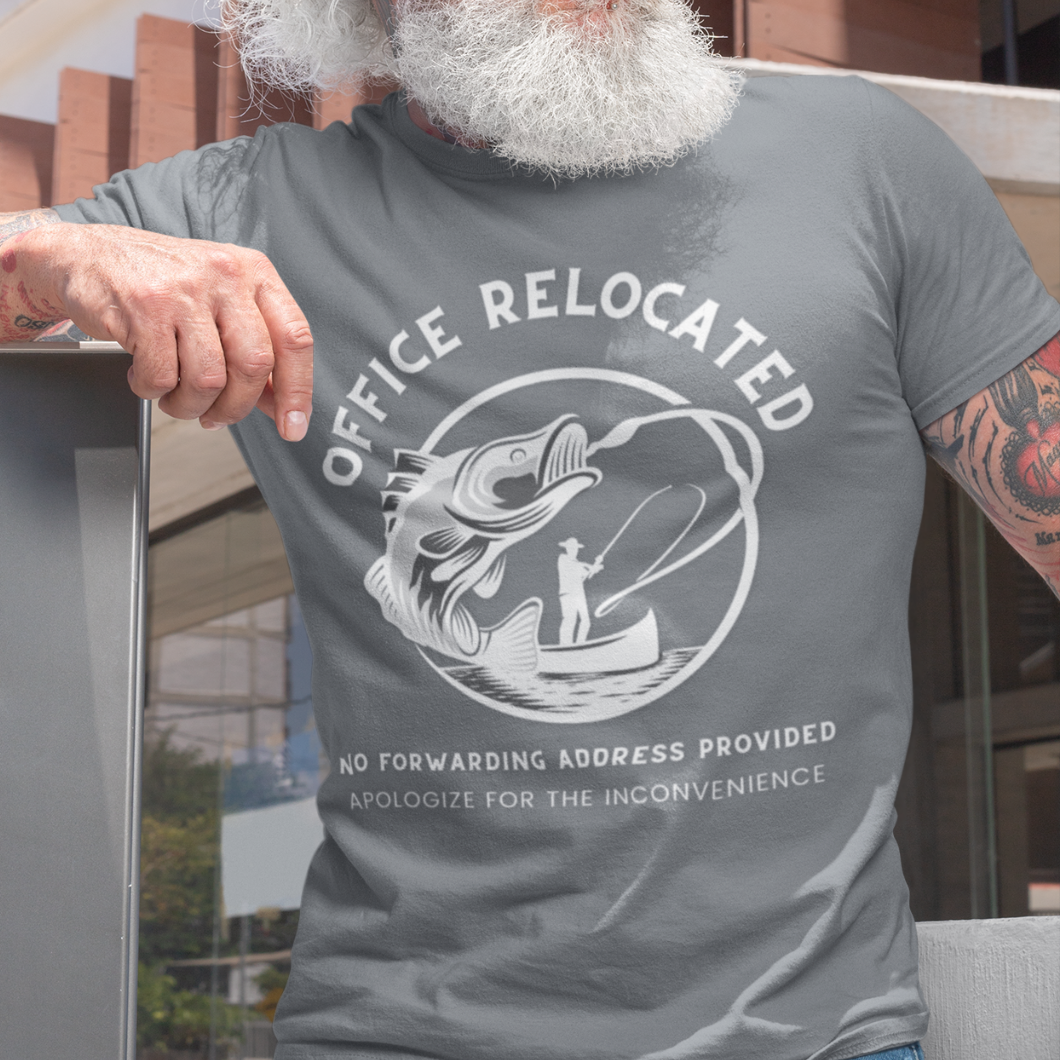 Heather gray t-shirt featuring a fisherman hooking a big bass that reads Office Relocated No Forwarding Address Provided Apologize for the Inconvenience