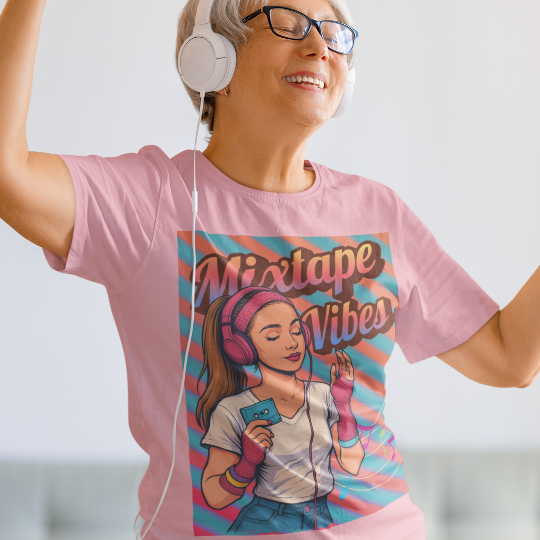 Light pink tee featuring a teenage girl from the 1980s listening to her cassette player with the pastel colors of that era