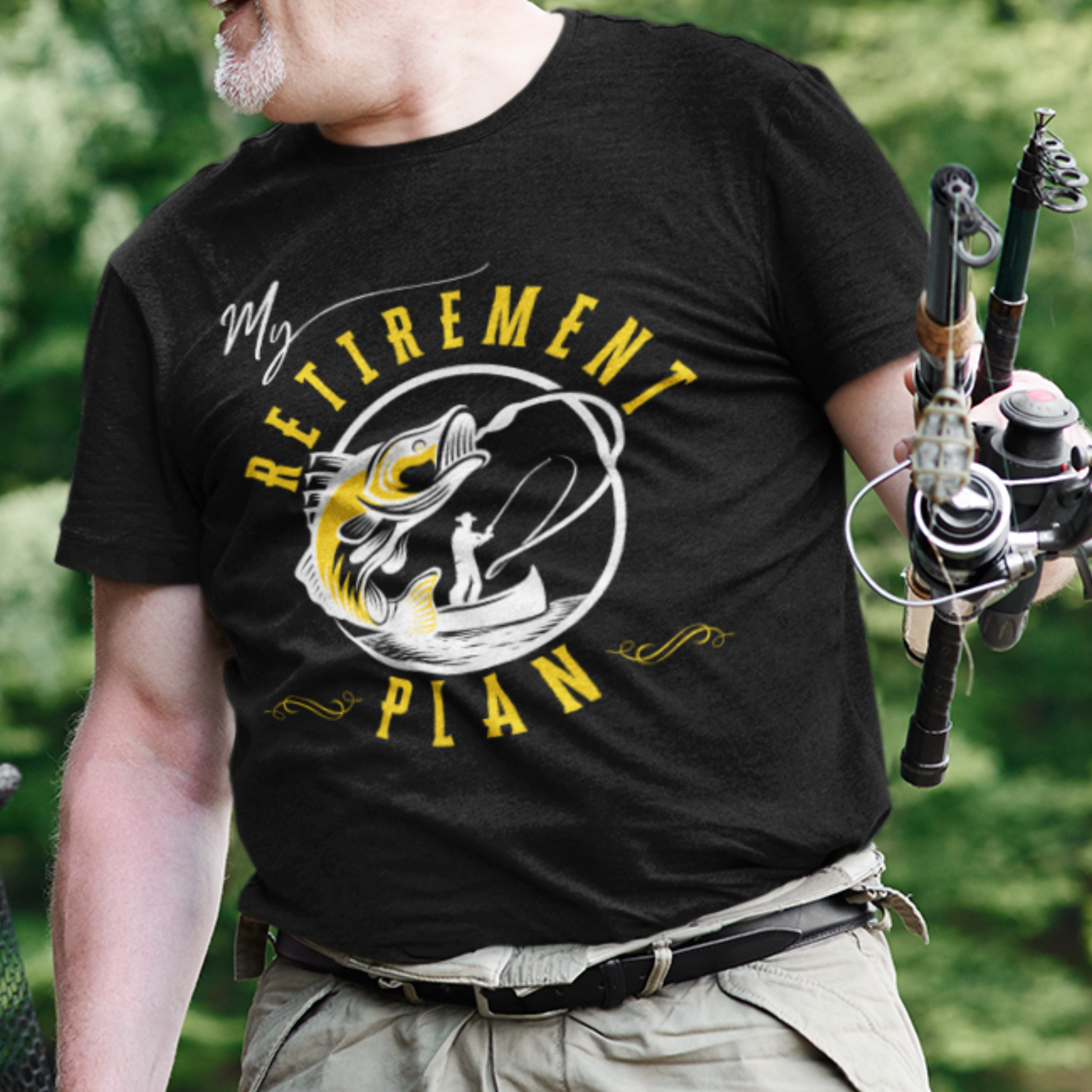 Black t-shirt featuring a fisherman hooking a big bass on a fishing line. 