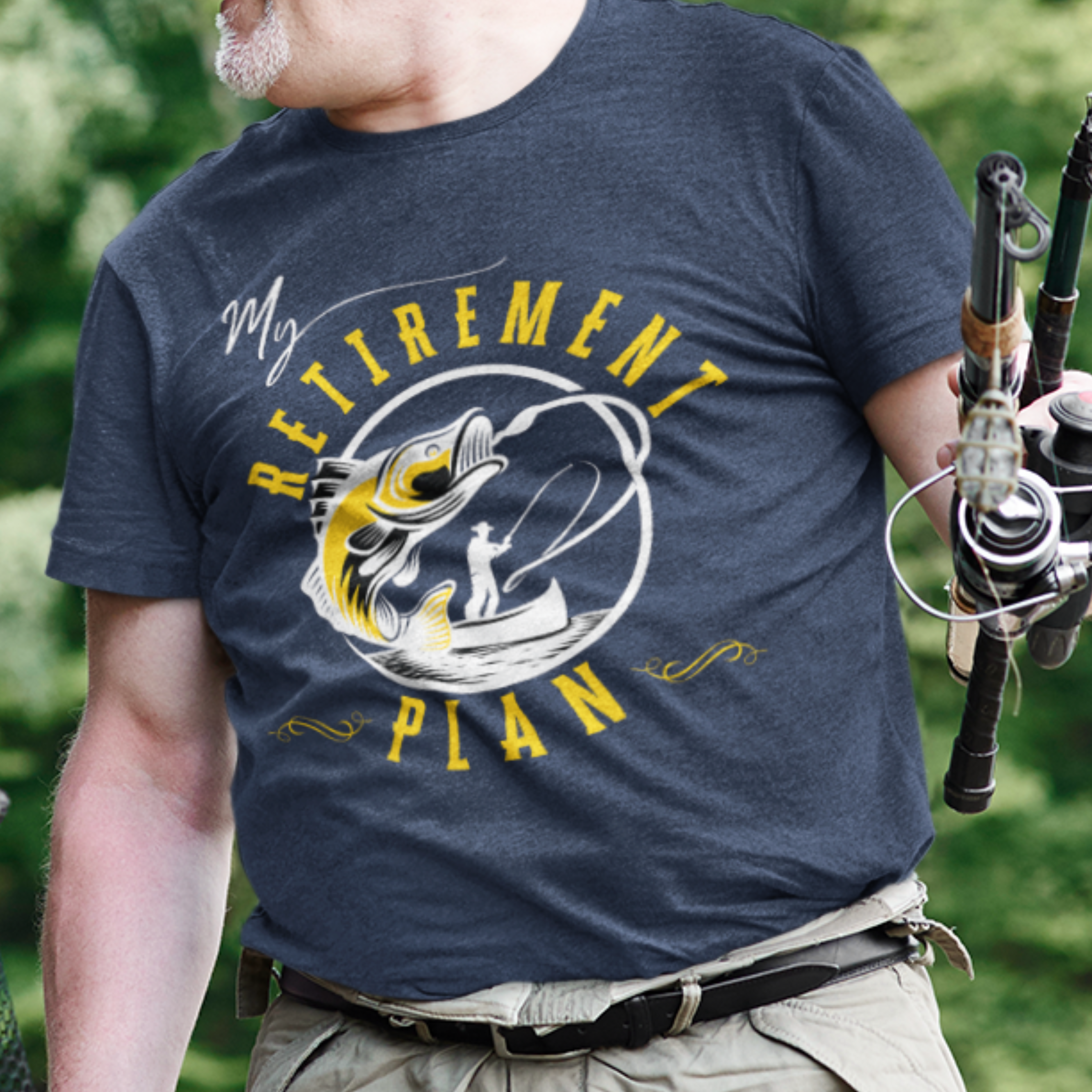 Navy blue t-shirt featuring a fisherman hooking a big bass on a fishing line. 