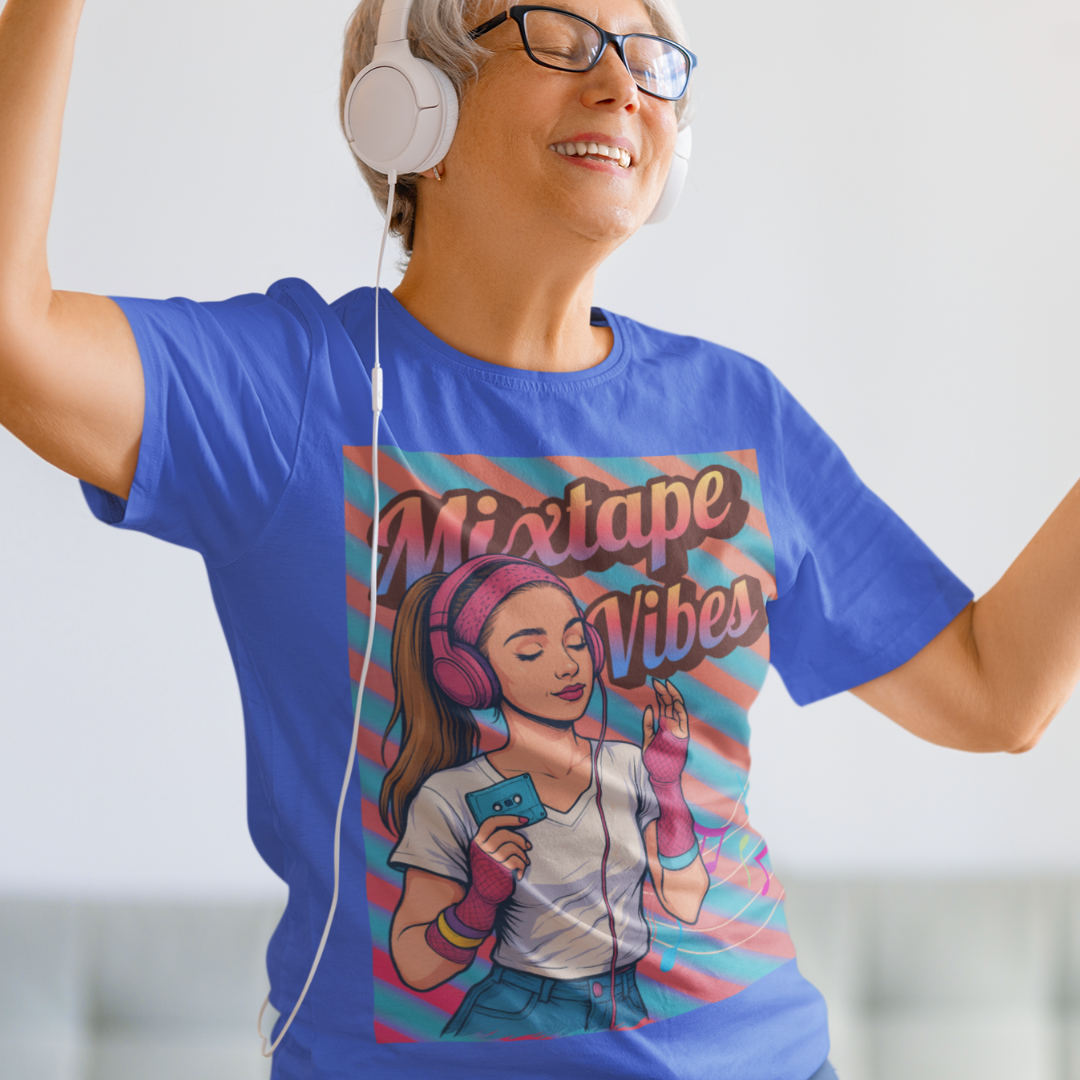 Royal blue tee featuring a teenage girl from the 1980s listening to her cassette player with the pastel colors of that era