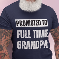 Navy blue tee featuring bold lettering that reads "Promoted to Full Time Grandpa"