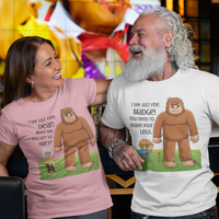 Light pink tee featuring an old woman with poor eyesight confusing hairy Bigfoot for her husband