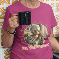 Dark pink (Antique Heliconia)i tee featuring a senior woman at her kitchen table enjoying a hot cup of coffee.